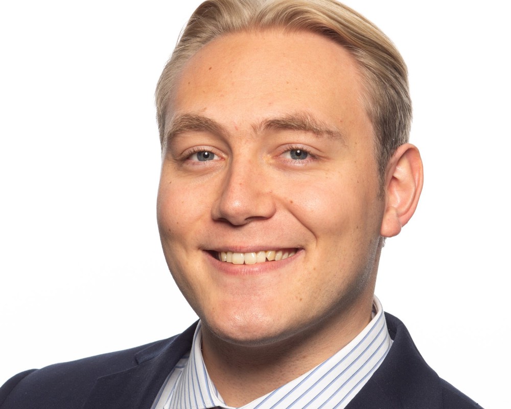 portrait of young man, short blond hair, blazer and shirt