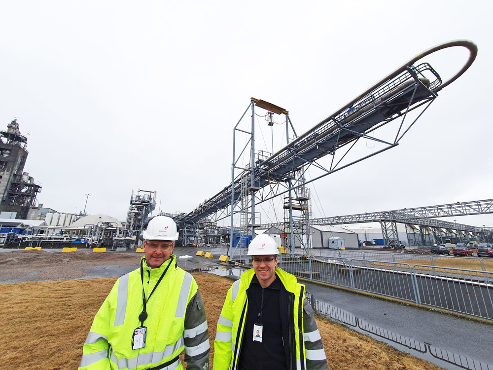 two men posing, test rig